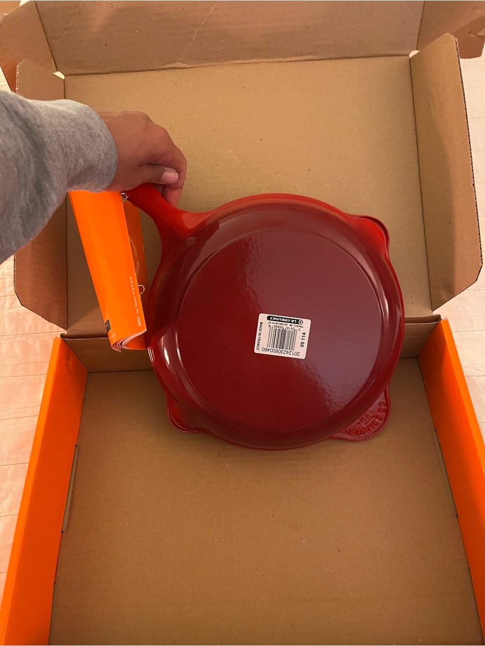 Le Creuset Red Cast Iron Skillet with Black Interior - Picture 2 of 3